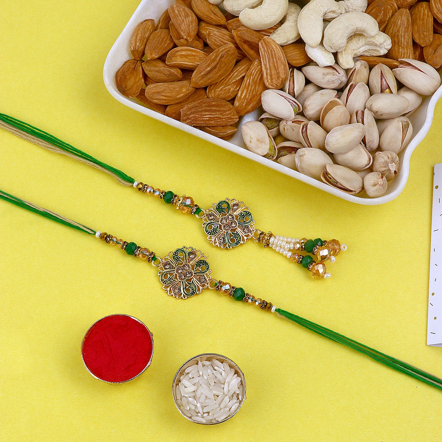 Green Designer Rakhi with Dry Fruits Green Designer Rakhi with Dry Fruits