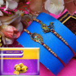 Padmabuja Peacock Design Rakhi with Besan Laddu